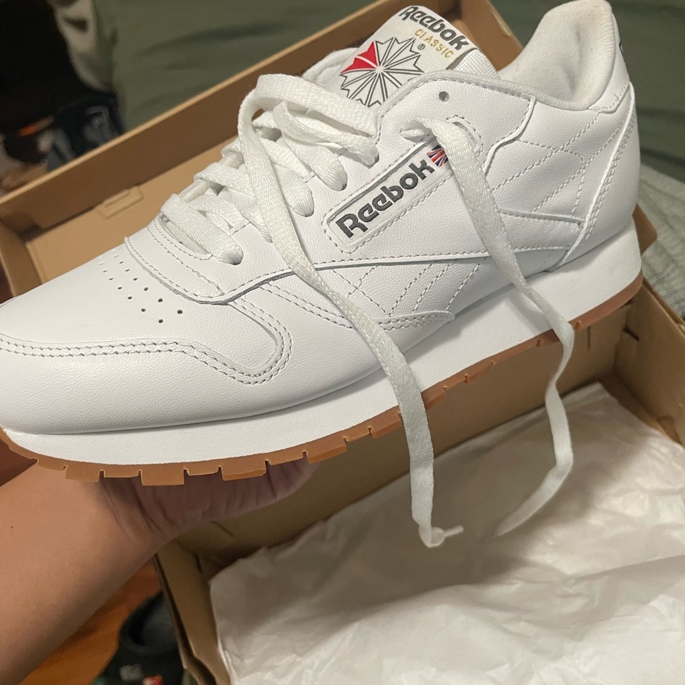 Brand new reebok classic!! never been worn!! comes from pet free house!!